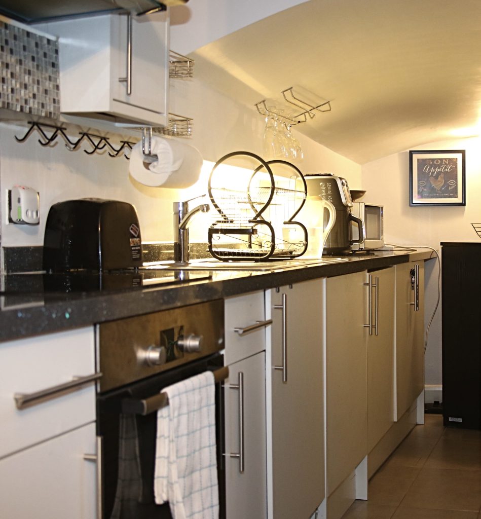 Private kitchen with oven, kettle, toaster and worktop