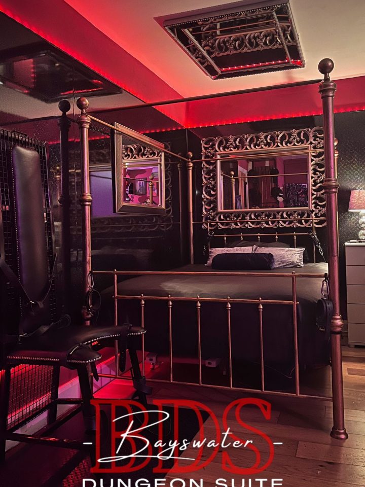 New metal four-poster bed in the Bayswater dungeon bedroom